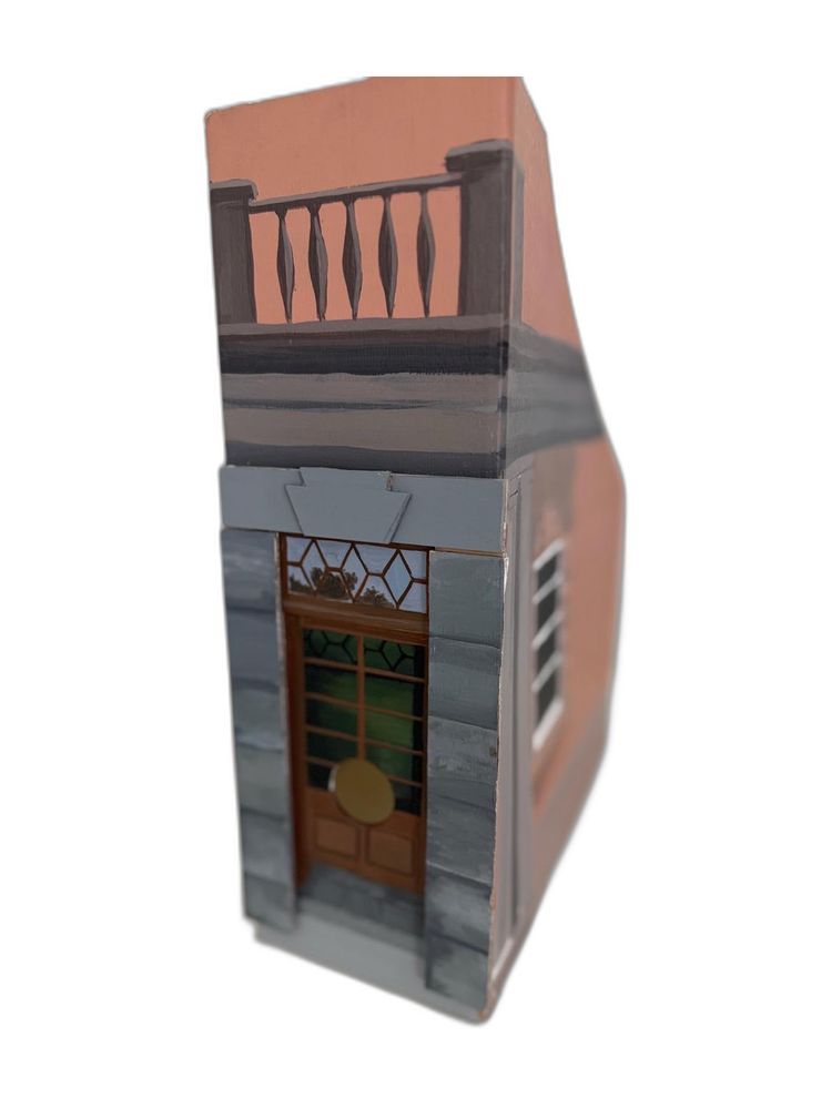 Pink wooden townhouse object painted in acrylic